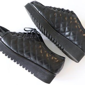 black leather sneakers